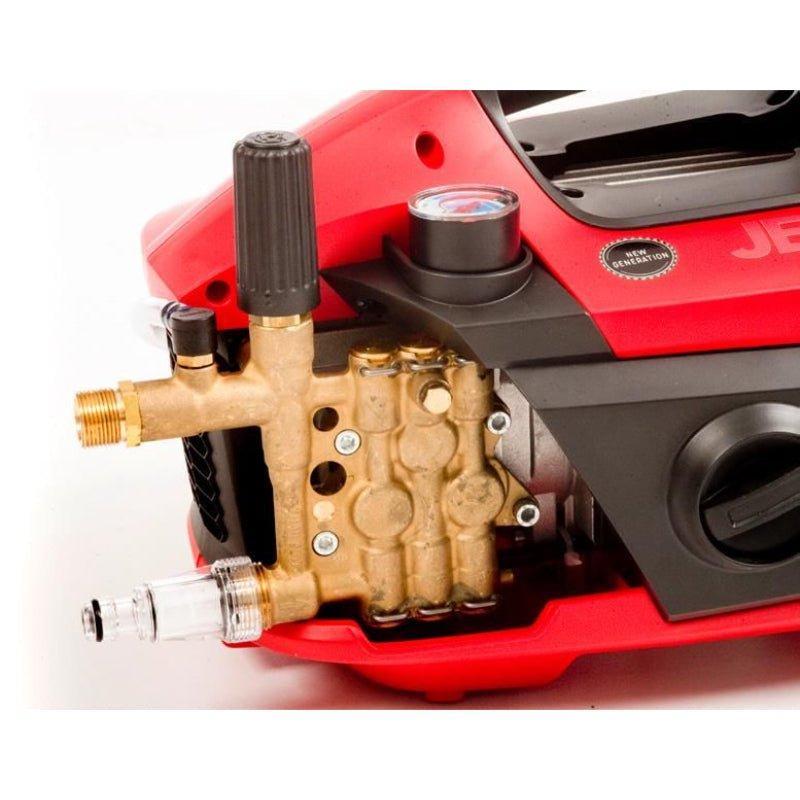 Close-up of a red and black pressure washer with a gold pump on a white background